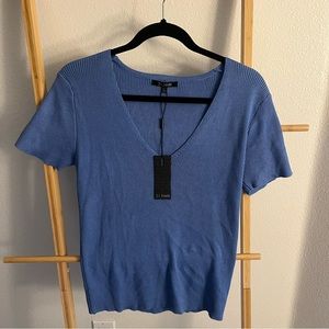 Rue21 blue knit top size L. New with tags.